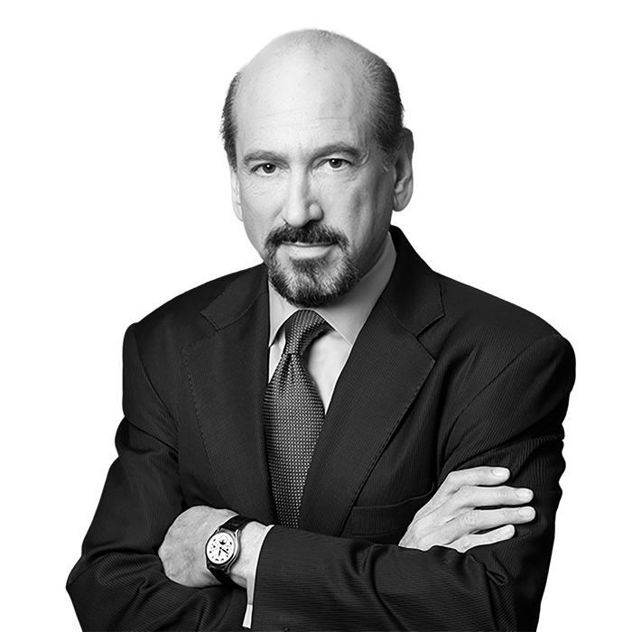 Photo of Mike Sitrick standing with arms crossed